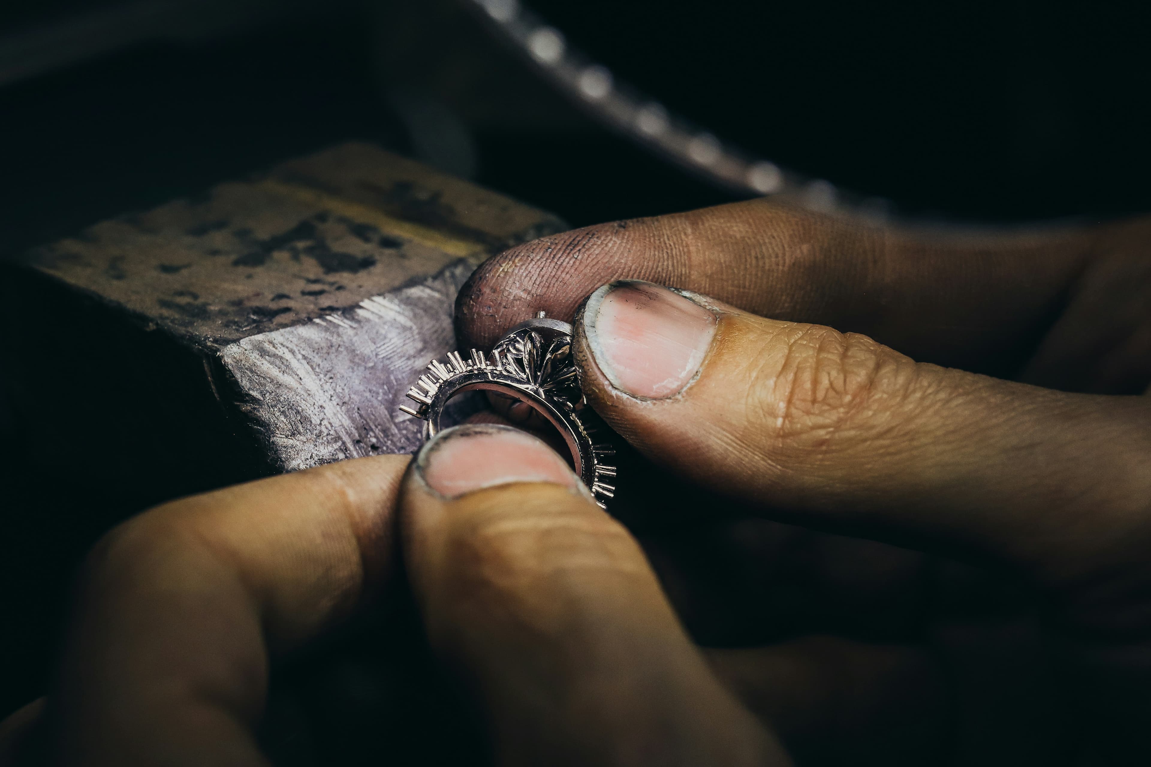 Master craftsman setting a diamond